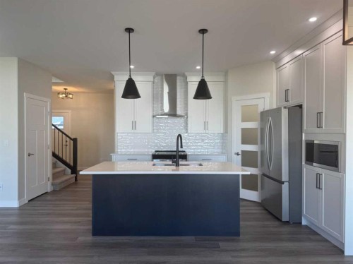 49 Emmett Crescent, Red Deer, AB - Indoor Photo Showing Kitchen With Stainless Steel Kitchen With Double Sink With Upgraded Kitchen