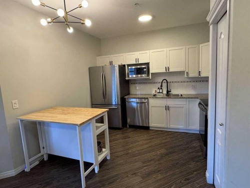 371-333 Riverfront Avenue Se, Calgary, AB - Indoor Photo Showing Kitchen With Stainless Steel Kitchen With Double Sink