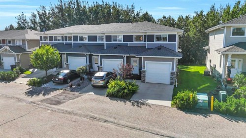 5-5301 Windward Place, Sylvan Lake, AB - Outdoor With Facade