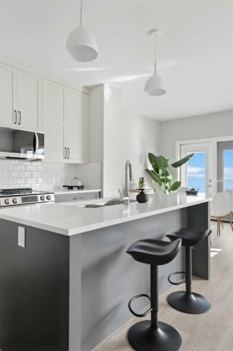 114 Palmer Circle, Blackfalds, AB - Indoor Photo Showing Kitchen With Upgraded Kitchen