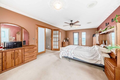 9 Rustic Road, Norglenwold, AB - Indoor Photo Showing Bedroom