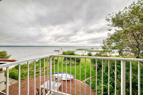 9 Rustic Road, Norglenwold, AB - Outdoor With Body Of Water