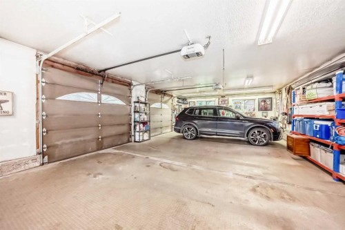 9 Rustic Road, Norglenwold, AB - Indoor Photo Showing Garage