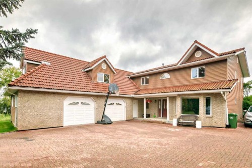 9 Rustic Road, Norglenwold, AB - Outdoor With Deck Patio Veranda