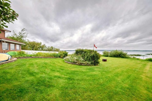 9 Rustic Road, Norglenwold, AB - Outdoor With Body Of Water