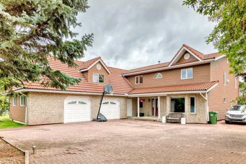 9 Rustic Road, Norglenwold, AB - Outdoor With Deck Patio Veranda