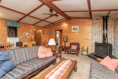 224-41124 Range Road 282 Range, Gull Lake, AB - Indoor Photo Showing Living Room With Fireplace