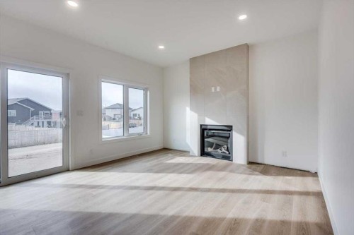 13 Aztec Street, Blackfalds, AB - Indoor Photo Showing Living Room With Fireplace