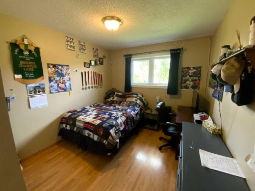 231052 330 Township, Rural Kneehill County, AB - Indoor Photo Showing Bedroom