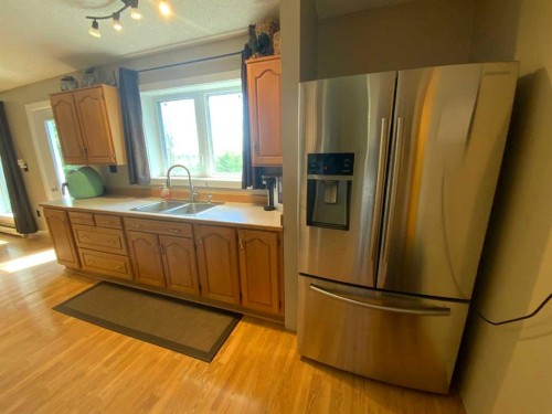 231052 330 Township, Rural Kneehill County, AB - Indoor Photo Showing Kitchen With Double Sink