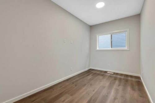 3 Heritage Link, Cochrane, AB - Indoor Photo Showing Other Room