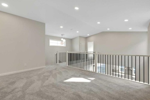 3 Heritage Link, Cochrane, AB - Indoor Photo Showing Other Room