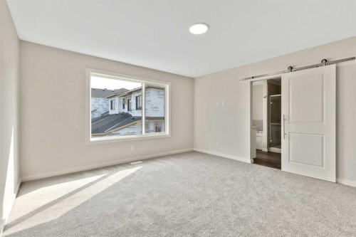 3 Heritage Link, Cochrane, AB - Indoor Photo Showing Other Room