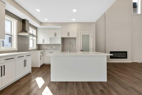 3 Heritage Link, Cochrane, AB - Indoor Photo Showing Kitchen With Upgraded Kitchen