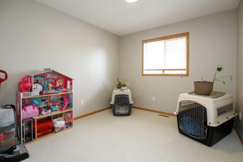 107 Ackerman Crescent, Red Deer, AB - Indoor Photo Showing Bedroom