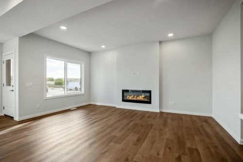 27 Heritage Link, Cochrane, AB - Indoor With Fireplace