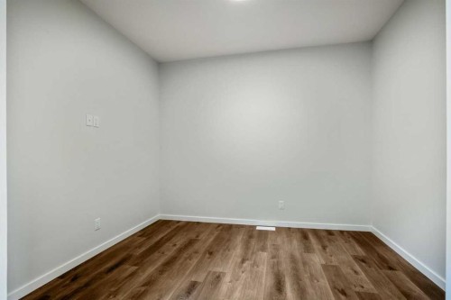 27 Heritage Link, Cochrane, AB - Indoor Photo Showing Other Room