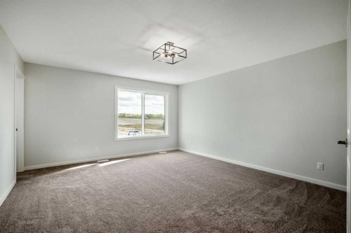 27 Heritage Link, Cochrane, AB - Indoor Photo Showing Other Room