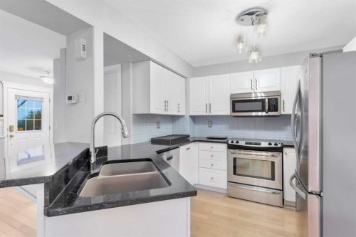 10-73 Addington Drive, Red Deer, AB - Indoor Photo Showing Kitchen With Stainless Steel Kitchen With Double Sink