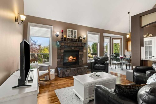 48 Fieldstone Way, Sylvan Lake, AB - Indoor Photo Showing Living Room With Fireplace