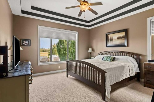 48 Fieldstone Way, Sylvan Lake, AB - Indoor Photo Showing Bedroom