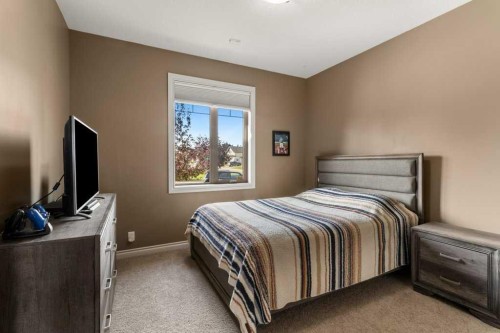 48 Fieldstone Way, Sylvan Lake, AB - Indoor Photo Showing Bedroom