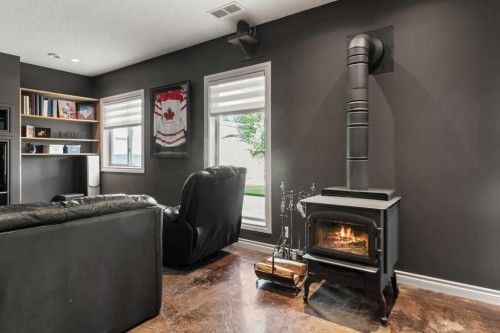 48 Fieldstone Way, Sylvan Lake, AB - Indoor With Fireplace