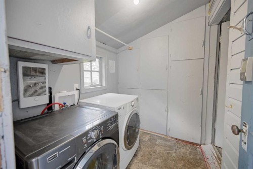 4738 50 Street East, Sylvan Lake, AB - Indoor Photo Showing Laundry Room