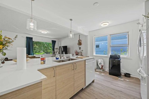 2311 16 Street Sw, Calgary, AB - Indoor Photo Showing Kitchen With Double Sink