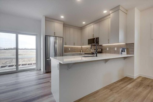 56 Emmett Crescent, Red Deer, AB - Indoor Photo Showing Kitchen With Upgraded Kitchen