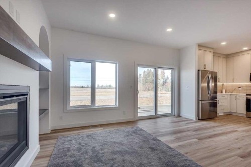 56 Emmett Crescent, Red Deer, AB - Indoor With Fireplace