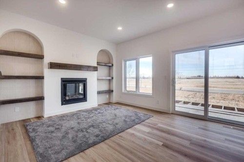 56 Emmett Crescent, Red Deer, AB - Indoor Photo Showing Living Room With Fireplace
