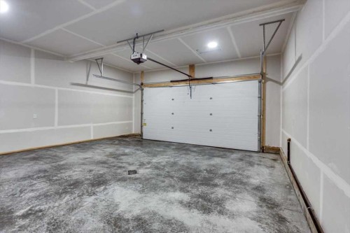 56 Emmett Crescent, Red Deer, AB - Indoor Photo Showing Garage