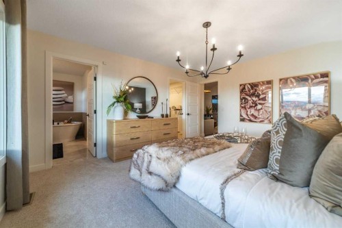 115 Saddlebred Place, Cochrane, AB - Indoor Photo Showing Bedroom