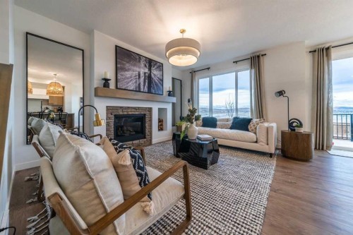 115 Saddlebred Place, Cochrane, AB - Indoor Photo Showing Living Room With Fireplace