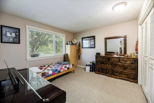 33 Fairway Drive, Lacombe, AB - Indoor Photo Showing Bedroom