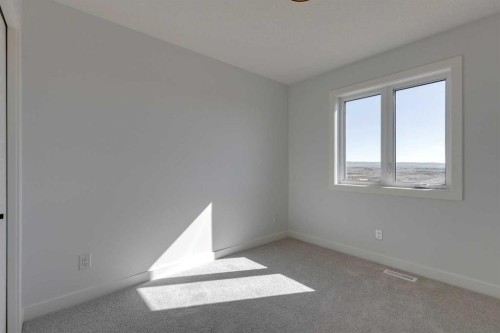 95 Southborough Crescent, Cochrane, AB - Indoor Photo Showing Other Room