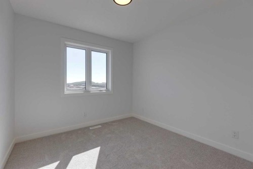 95 Southborough Crescent, Cochrane, AB - Indoor Photo Showing Other Room