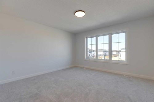 95 Southborough Crescent, Cochrane, AB - Indoor Photo Showing Other Room