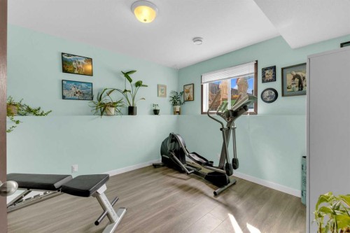 21 Hunter Road, Sylvan Lake, AB - Indoor Photo Showing Gym Room