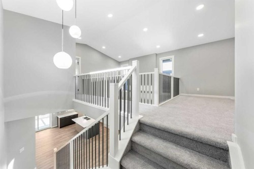 16 Heritage Link, Cochrane, AB - Indoor Photo Showing Other Room