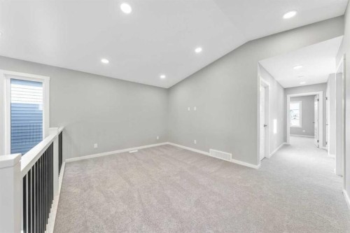 16 Heritage Link, Cochrane, AB - Indoor Photo Showing Other Room