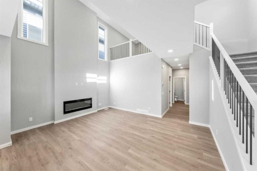 16 Heritage Link, Cochrane, AB - Indoor With Fireplace