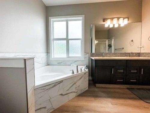 4438 Van Eaton Way, Clive, AB - Indoor Photo Showing Bathroom