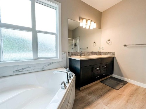 4438 Van Eaton Way, Clive, AB - Indoor Photo Showing Bathroom