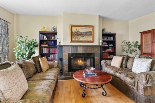 3948 35A Avenue, Red Deer, AB - Indoor Photo Showing Living Room With Fireplace