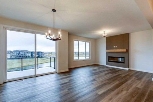 199 Sora Terrace Se, Calgary, AB - Indoor Photo Showing Living Room With Fireplace