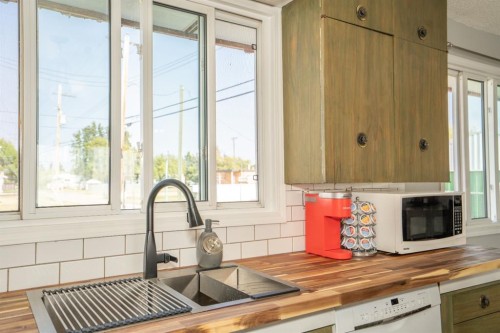 5011 51St Ave, Bashaw, AB - Indoor Photo Showing Kitchen With Double Sink