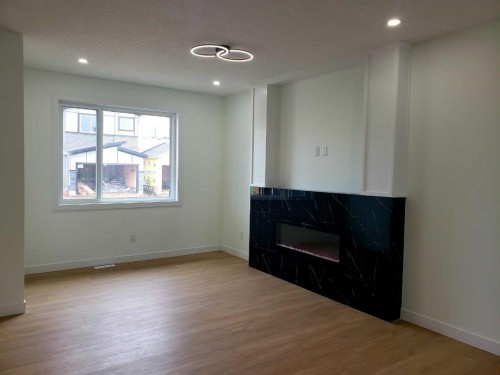 120 28 Street Sw, Edmonton, AB - Indoor With Fireplace