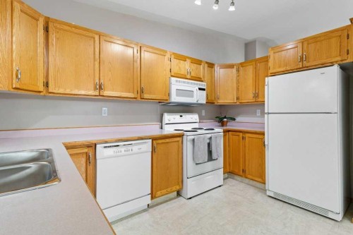 9 Dunn Close, Red Deer, AB - Indoor Photo Showing Kitchen With Double Sink